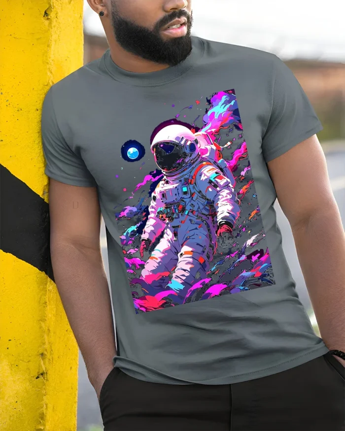 Astronaut Galaxy T-Shirt Neon Space Explorer Graphic - model in grey shirt leaning against column