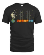 Astronaut Swinging on Planets Funny Space T-Shirt for Adults - black t-shirt on white background