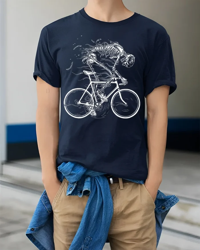 Skeleton Riding Bike T-Shirt for Cyclists and Gothic Fans - model wearing navy shirt, hands in pockets