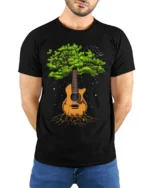 Tree Guitar Nature Music Graphic T-Shirt for Music Lovers - model wearing black shirt, hands behind back