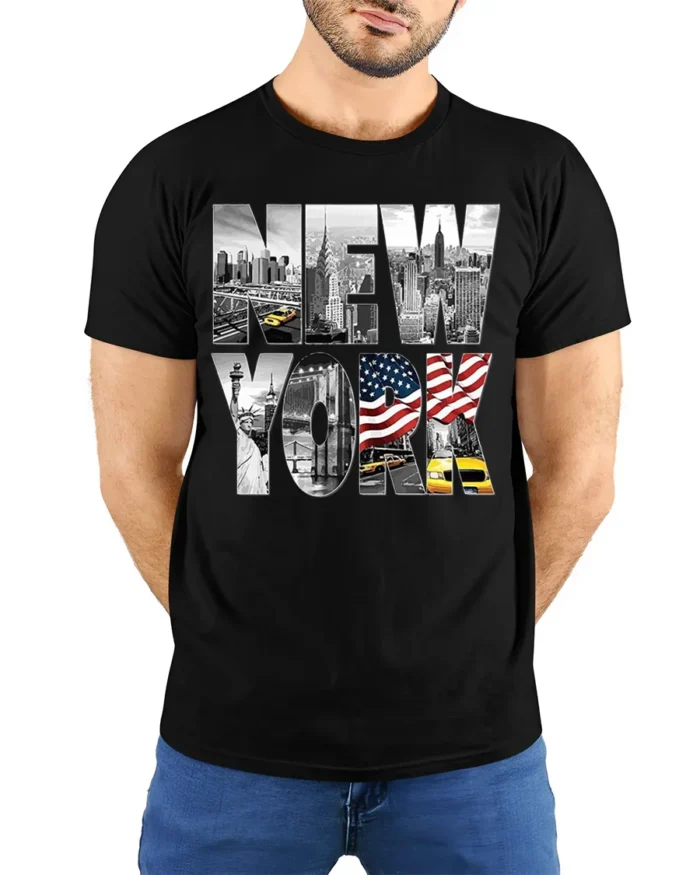 New York City Skyline T-Shirt with Statue and Flag Design - model wearing black shirt, hands behind back