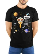 I Need More Space T-Shirt with Cute Robot and Planets - model wearing black shirt, hands behind back