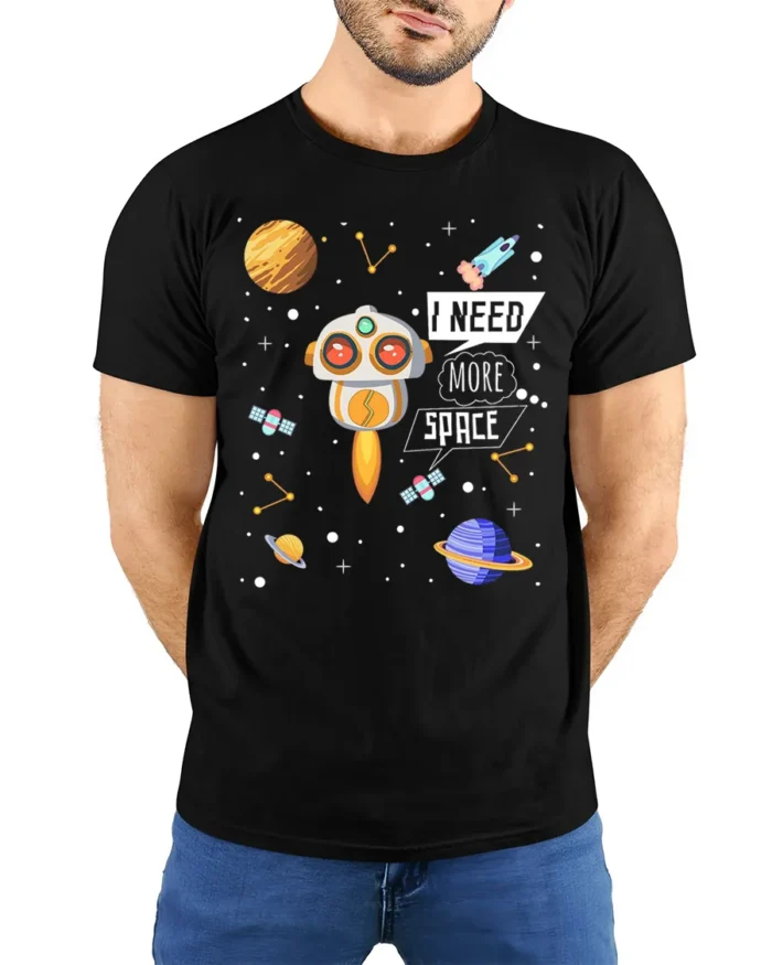 I Need More Space T-Shirt with Cute Robot and Planets - model wearing black shirt, hands behind back