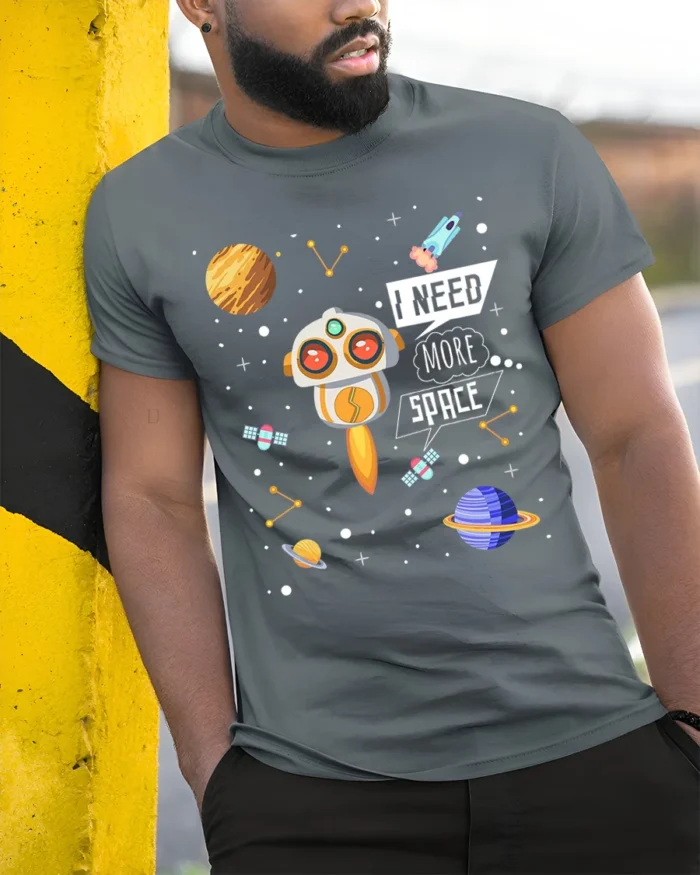 I Need More Space T-Shirt with Cute Robot and Planets - model in grey shirt leaning against column