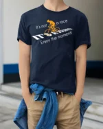 Cycling Journey T-Shirt It’s Not a Race Inspirational - model wearing navy shirt, hands in pockets