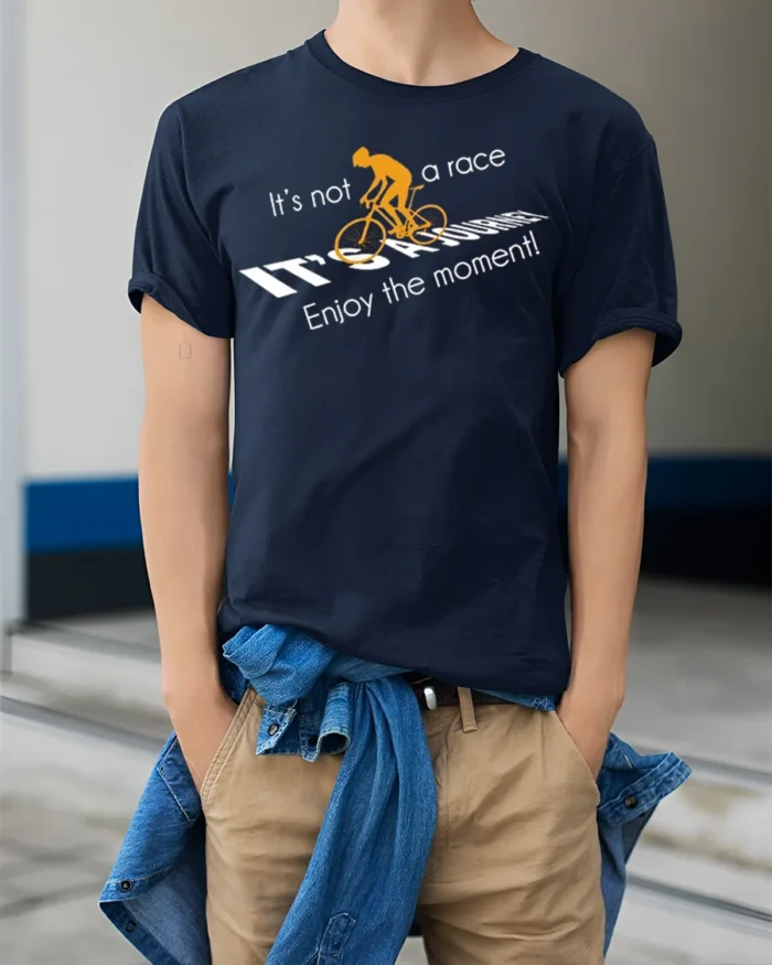 Cycling Journey T-Shirt It’s Not a Race Inspirational - model wearing navy shirt, hands in pockets