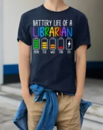 Battery Life of a Librarian T-Shirt Funny Workweek - model wearing navy shirt, hands in pockets