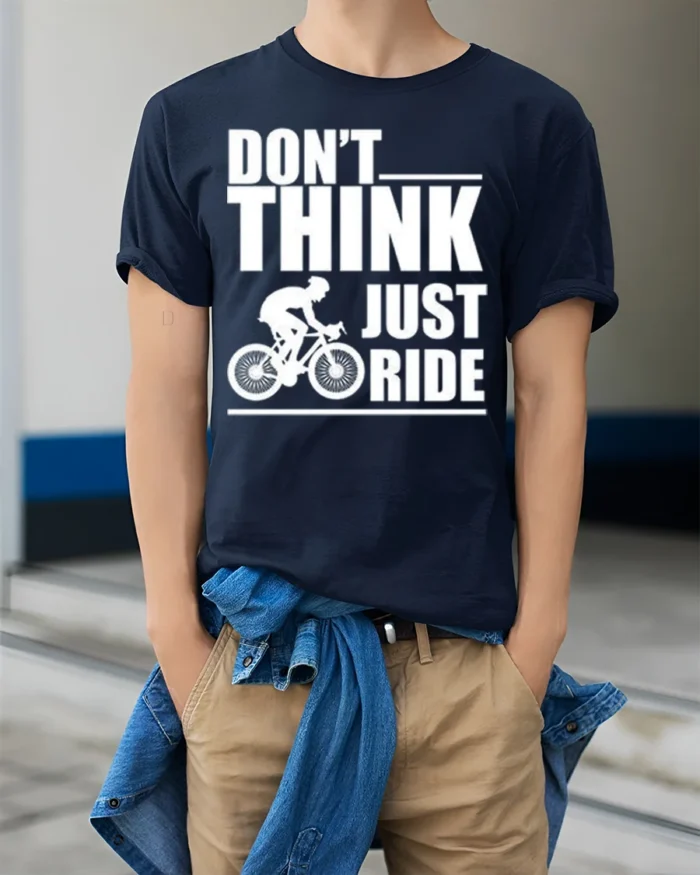 Don’t Think Just Ride Cycling T-Shirt Biker Motivation - model wearing navy shirt, hands in pockets