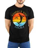 Respect the Locals T-Shirt Ocean Wildlife Sunset - model wearing black shirt, hands behind back