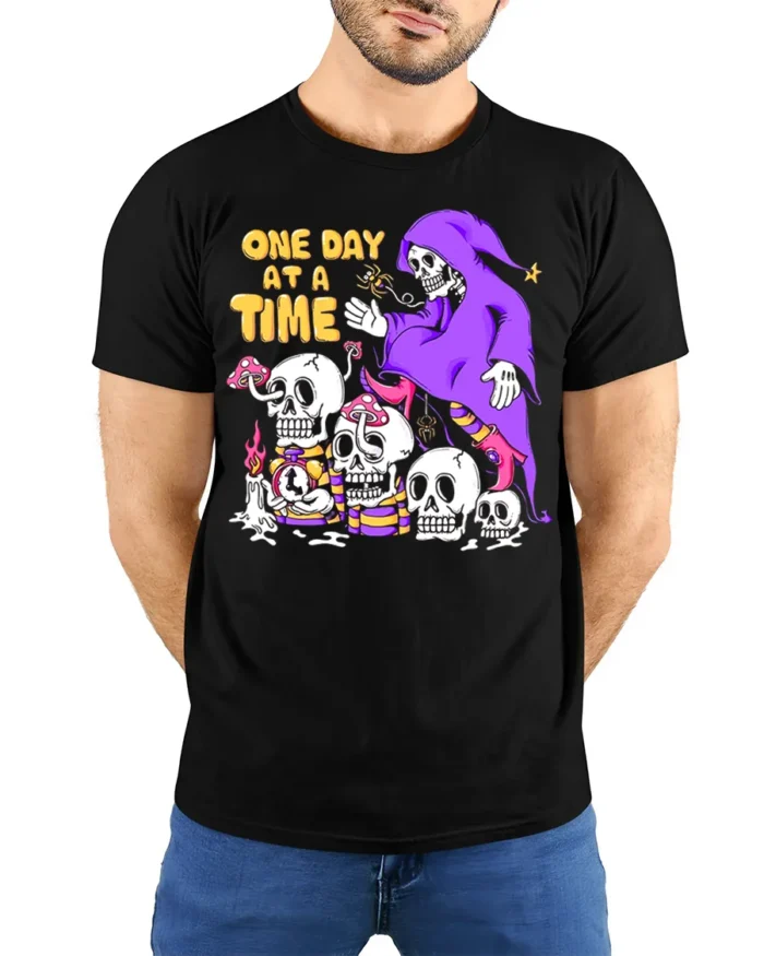 One Day at a Time Skeleton T-Shirt Grim Reaper Graphic - model wearing black shirt, hands behind back
