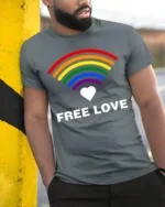 Free Love Rainbow Heart LGBTQ Pride T-Shirt Unisex Soft - model in grey shirt leaning against column