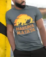 Hakuna Matata Sunset T-Shirt Carefree Jungle Vibes - model in grey shirt leaning against column