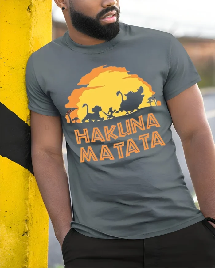 Hakuna Matata Sunset T-Shirt Carefree Jungle Vibes - model in grey shirt leaning against column