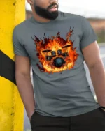 Flaming Drum Set T-Shirt Fire Music Graphic for Drummers - model in grey shirt leaning against column