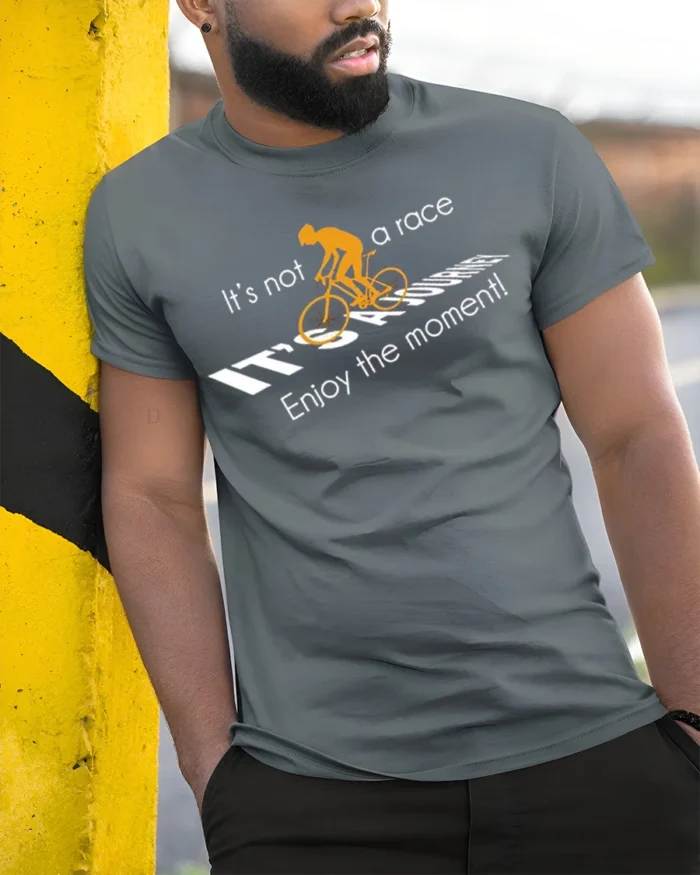 Cycling Journey T-Shirt It’s Not a Race Inspirational - model in grey shirt leaning against column