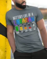 Battery Life of a Librarian T-Shirt Funny Workweek - model in grey shirt leaning against column