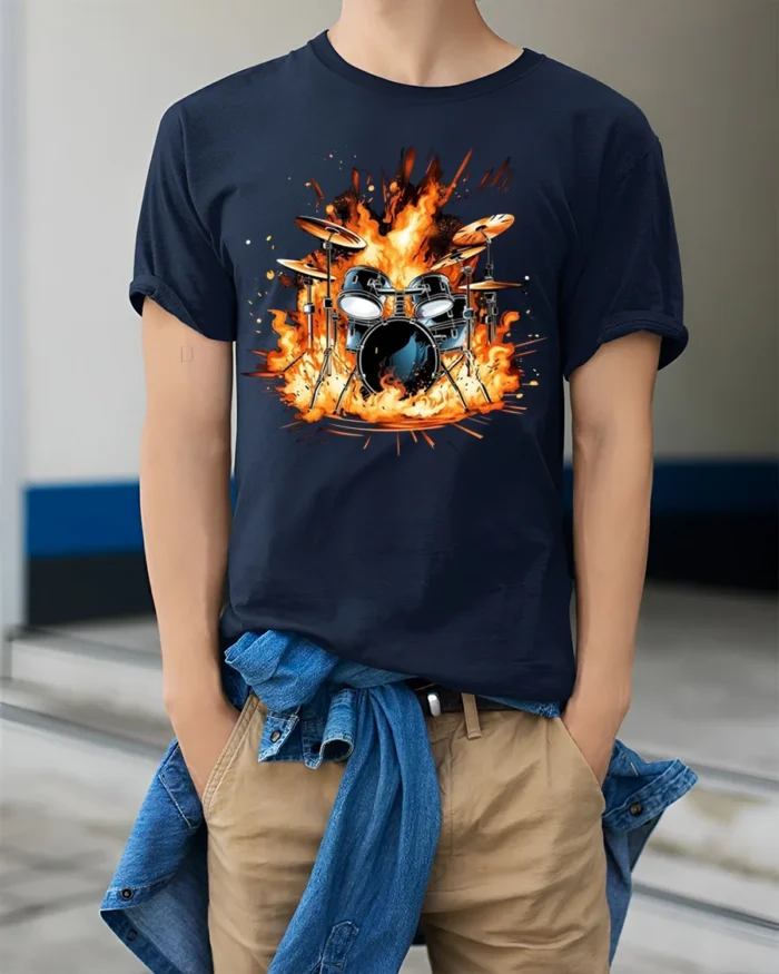 Drum Set on Fire T-Shirt Cool Rock Music Graphic - model wearing navy shirt, hands in pockets