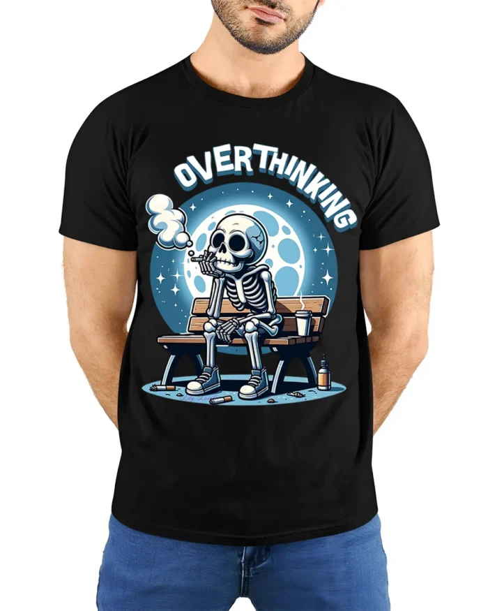 Overthinking Skeleton Sitting on Bench Graphic T-Shirt - model wearing black shirt, hands behind back