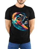 Astronaut Surfing Space Wave Retro Galaxy T-Shirt - model wearing black shirt, hands behind back