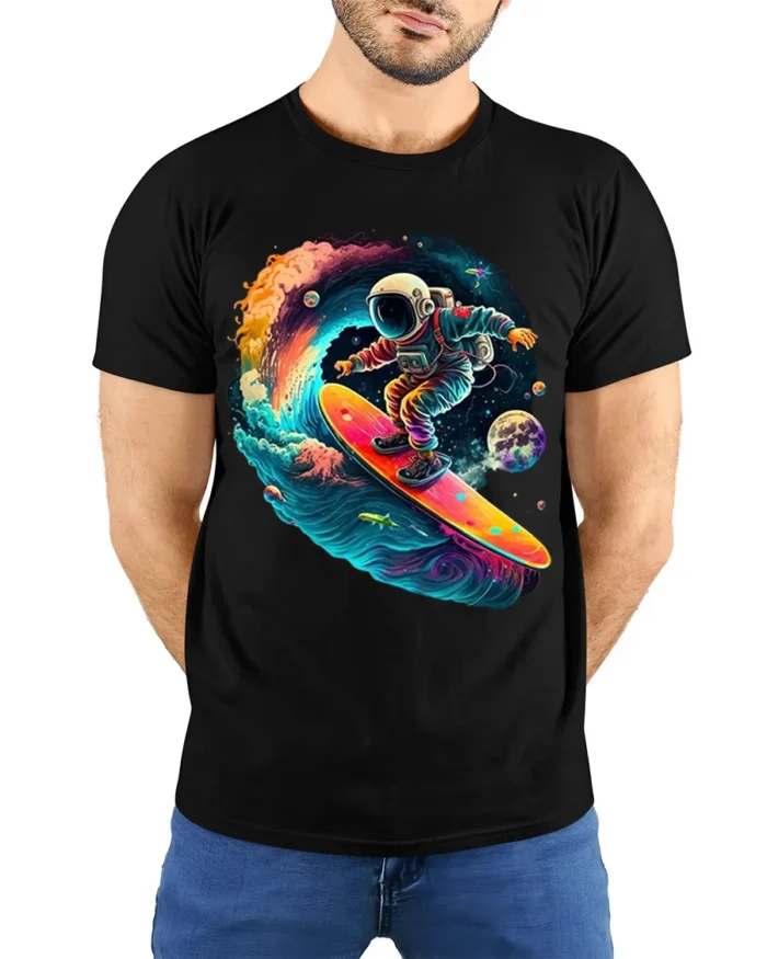 Astronaut Surfing Space Wave Retro Galaxy T-Shirt - model wearing black shirt, hands behind back
