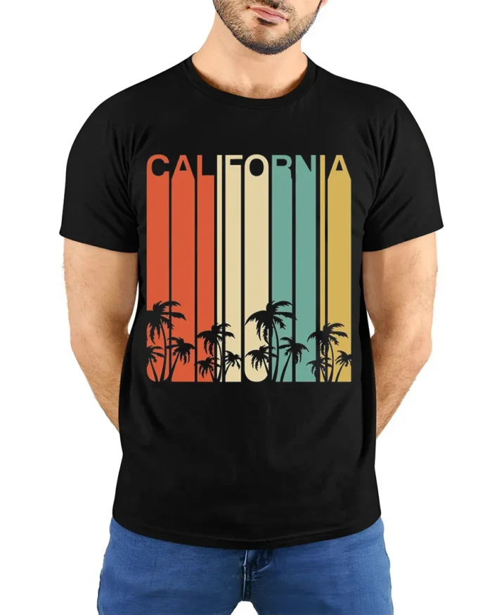 Retro California T-Shirt Vintage Sunset Palm Tree - model wearing black shirt, hands behind back