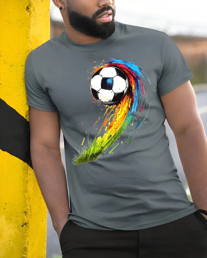 Color Splash Soccer Ball Graphic T-Shirt for Sports Fans - model in grey shirt leaning against column