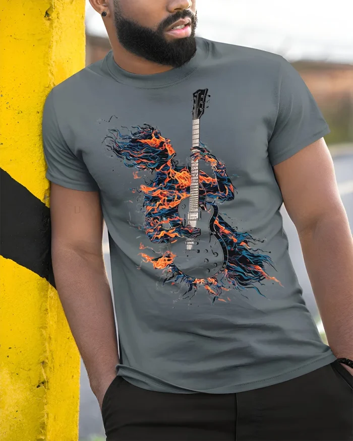 Flaming Guitarist T-Shirt Electric Fire Music Graphic - model in grey shirt leaning against column