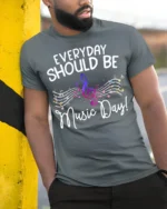 Everyday Should Be Music Day T-Shirt Colorful Music - model in grey shirt leaning against column