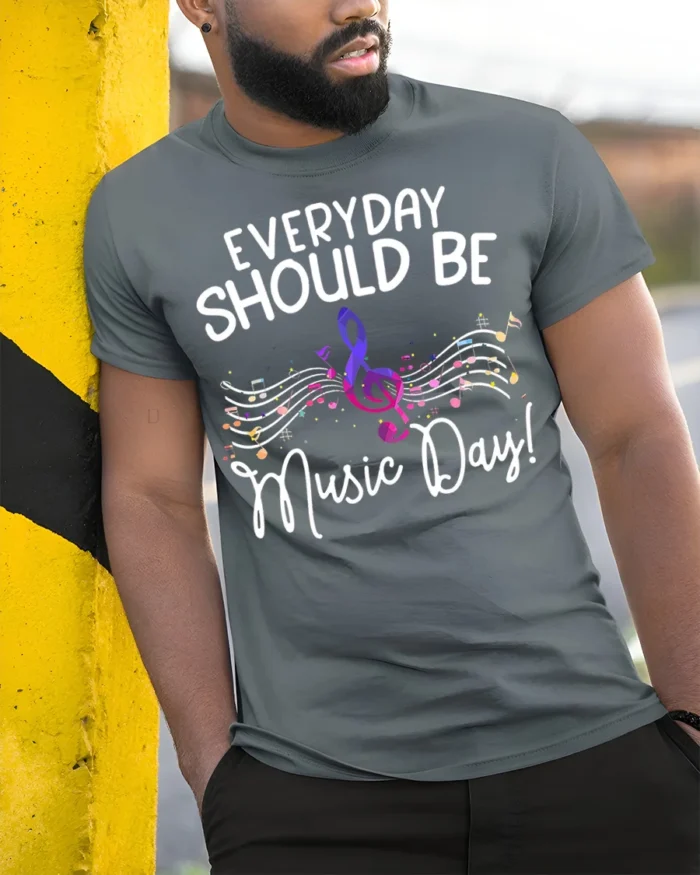 Everyday Should Be Music Day T-Shirt Colorful Music - model in grey shirt leaning against column