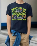 Funny Vegan T-Shirt Don’t Ask Me Why I’m Vegan Quote - model wearing navy shirt, hands in pockets