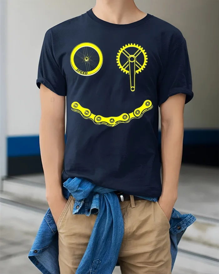 Smiley Bike Face T-Shirt Funny Cycling Chain Graphic - model wearing navy shirt, hands in pockets