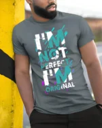 I’m Not Perfect I’m Original T-Shirt Bold Graphic - model in grey shirt leaning against column