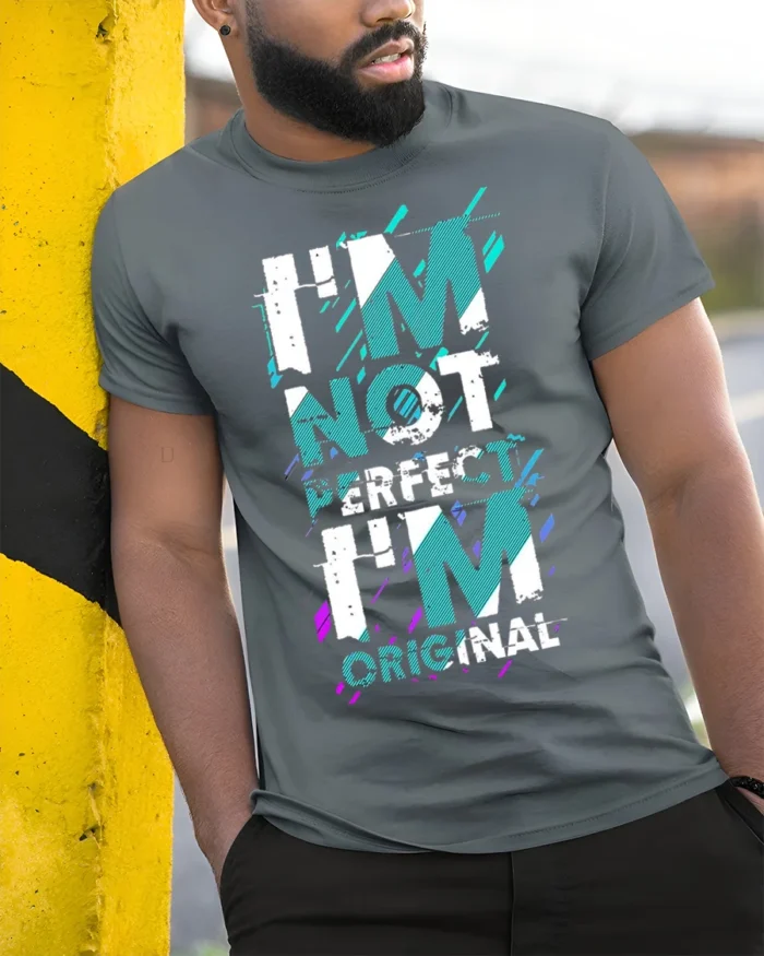 I’m Not Perfect I’m Original T-Shirt Bold Graphic - model in grey shirt leaning against column