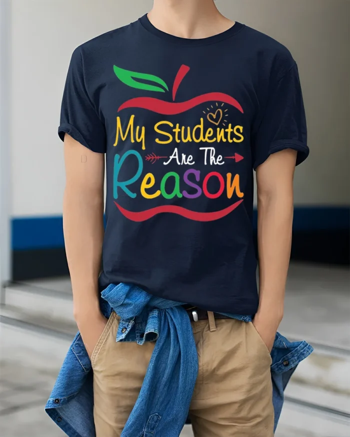 My Students Are The Reason Teacher Apple T-Shirt - model wearing navy shirt, hands in pockets