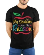 My Students Are The Reason Teacher Apple T-Shirt - model wearing black shirt, hands behind back