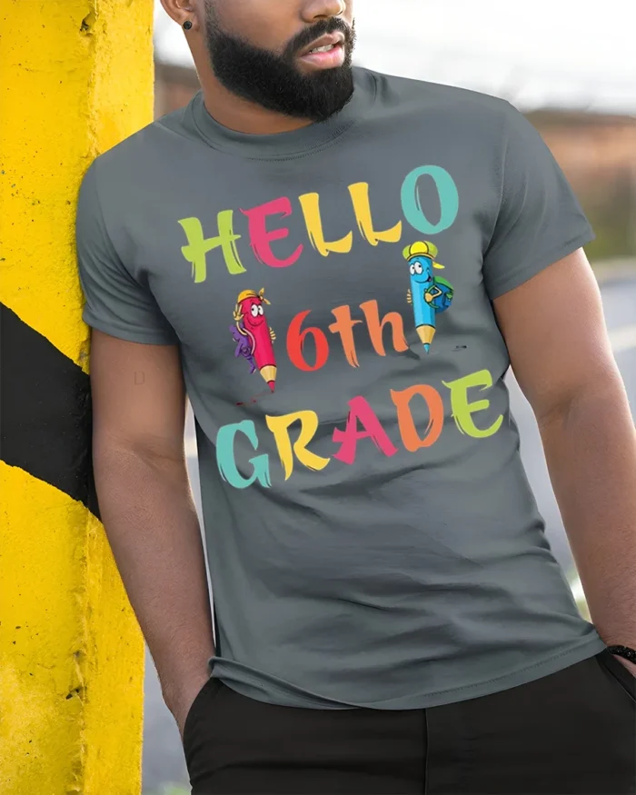 Hello 6th Grade Colorful Back to School T-Shirt - model in grey shirt leaning against column