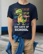 100 Days of School Dinosaur Superhero T-Shirt - model wearing navy shirt, hands in pockets