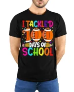 I Tackled 100 Days of School Football T-Shirt - model wearing black shirt, hands behind back