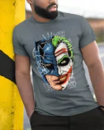 Split Face Batman Joker T-Shirt Hero vs Villain - model in grey shirt leaning against column