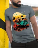 Retro Sunset Van T-Shirt Vintage Travel Vibes Tee - model in grey shirt leaning against column