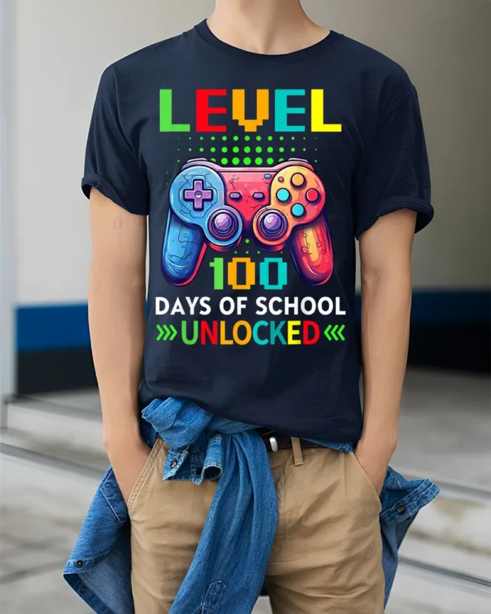 Level 100 Days of School Unlocked Gamer T-Shirt - model wearing navy shirt, hands in pockets