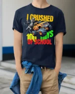 I Crushed 100 Days of School Monster Truck T-Shirt - model wearing navy shirt, hands in pockets