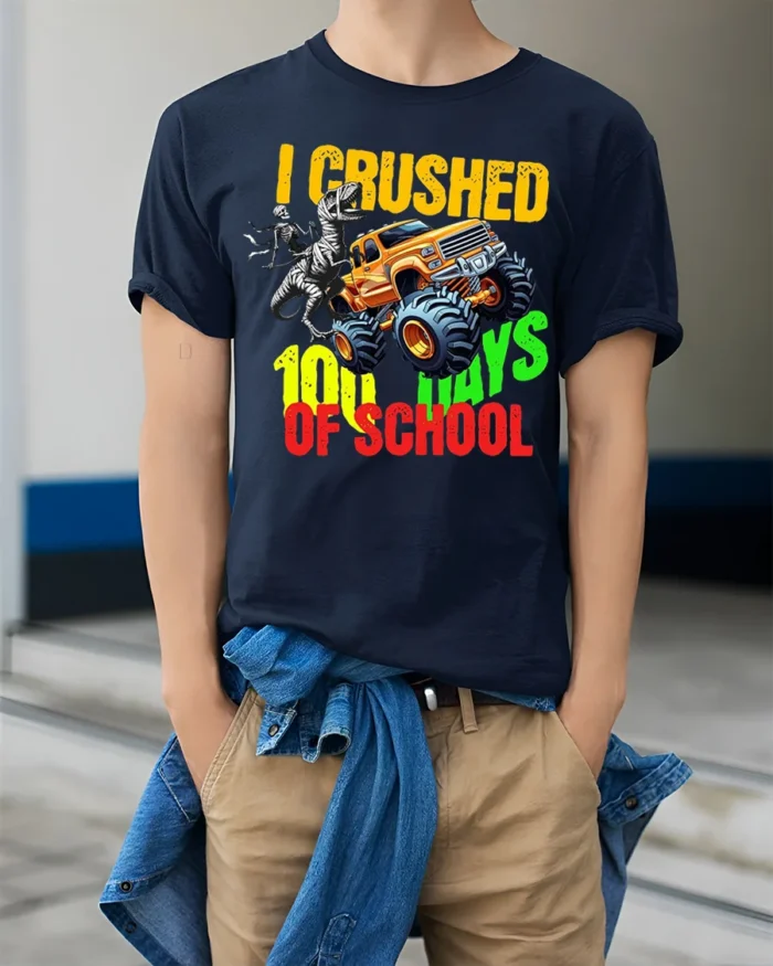 I Crushed 100 Days of School Monster Truck T-Shirt - model wearing navy shirt, hands in pockets