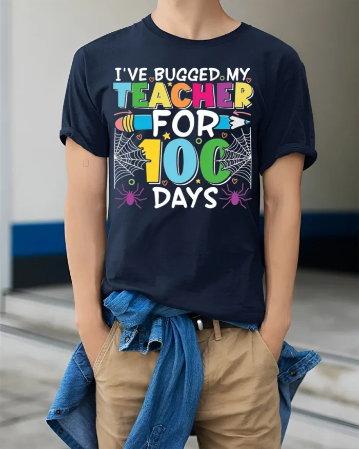 Bugged My Teacher for 100 Days T-Shirt Funny - model wearing navy shirt, hands in pockets