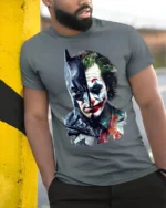Dark Knight vs Clown Villain Split Face T-Shirt - model in grey shirt leaning against column