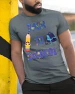Back to School Pencil and Backpack T-Shirt Fun - model in grey shirt leaning against column