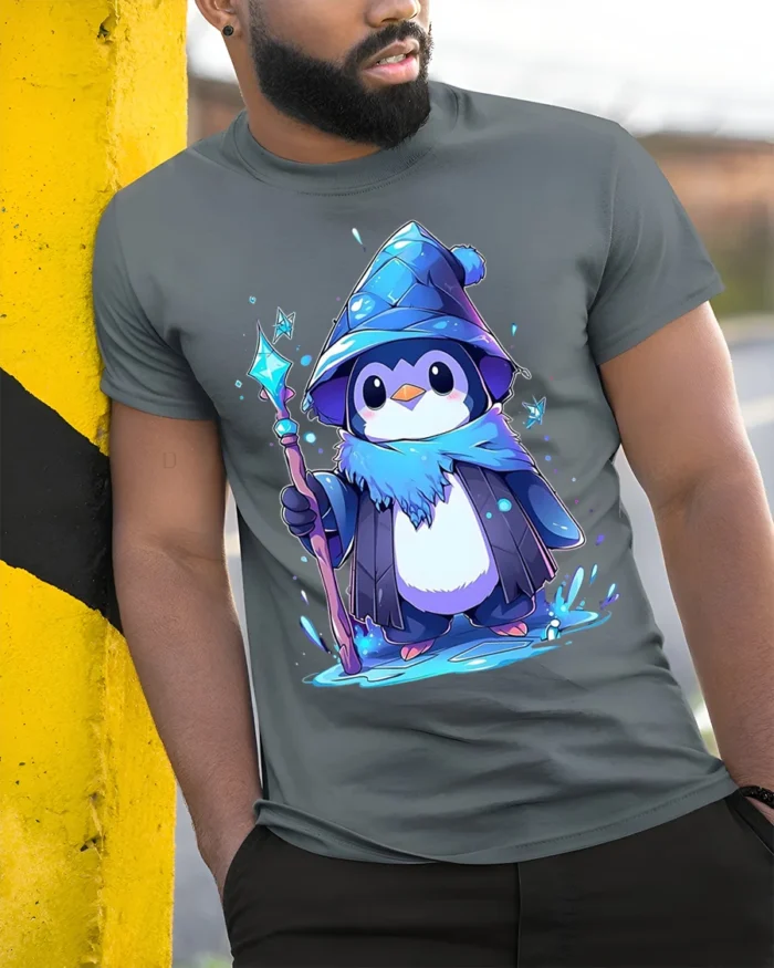 Wizard Penguin Magic Ice Staff Cute T-Shirt - model in grey shirt leaning against column