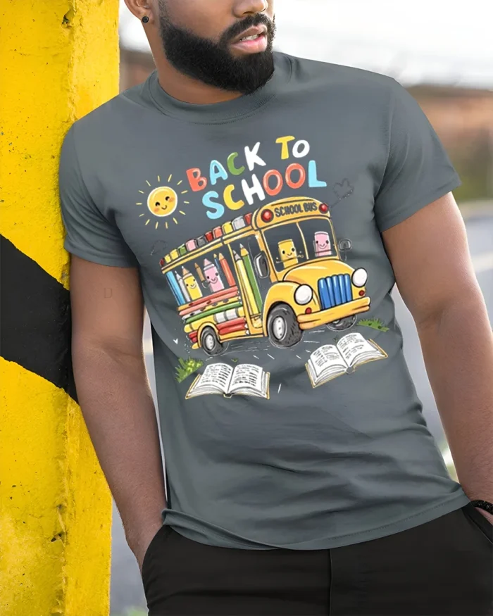 Cute Back to School T-Shirt with Bus and Pencils - model in grey shirt leaning against column