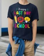 Happy Last Day of School T-Shirt Colorful Teacher - model wearing navy shirt, hands in pockets