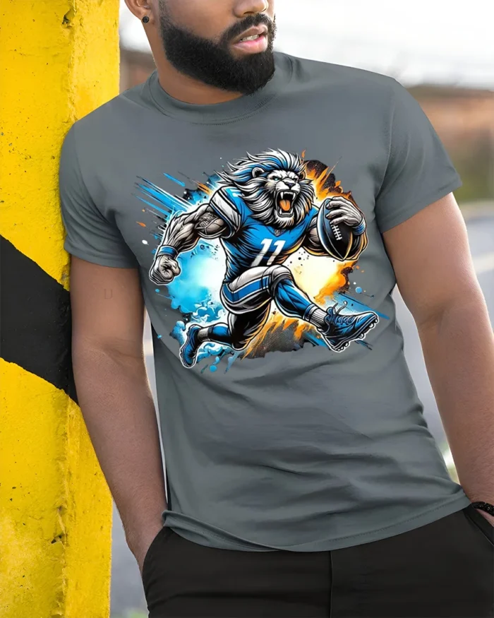 Lion Football Player T-Shirt Cool Sports Graphic Tee - model in grey shirt leaning against column